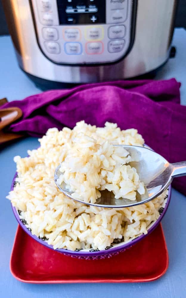 Instant Pot brown rice on a spoon