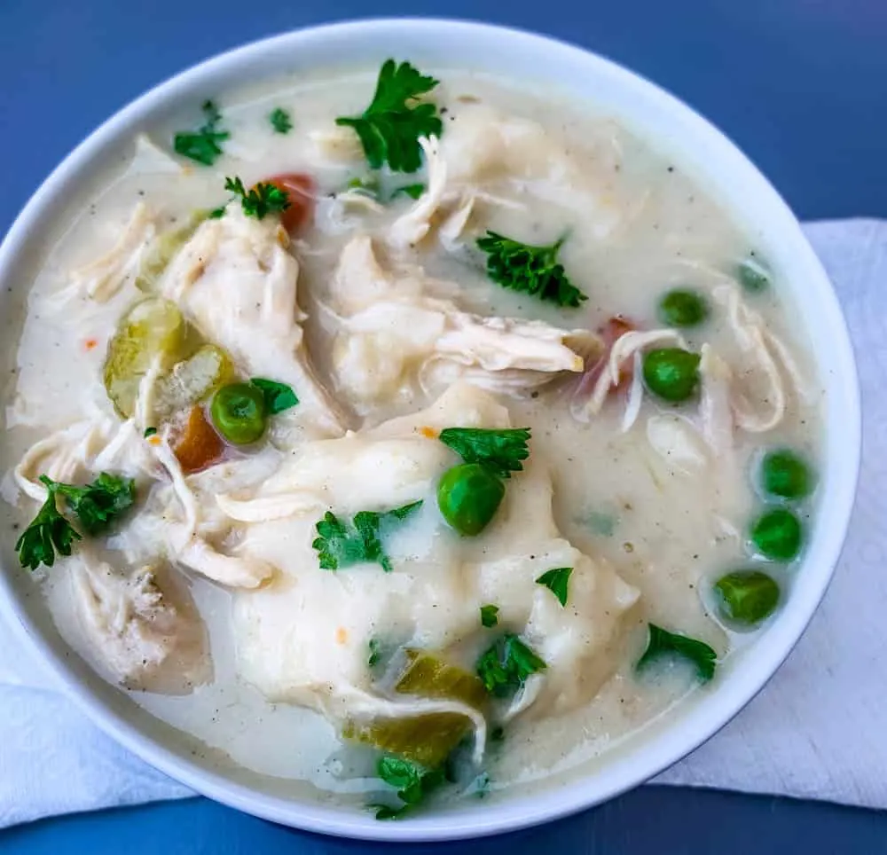instant pot chicken and dumplings from scratch in a white bowl