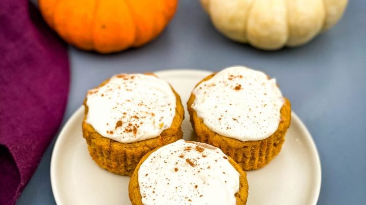keto low carb pumpkin muffins on a beige plate