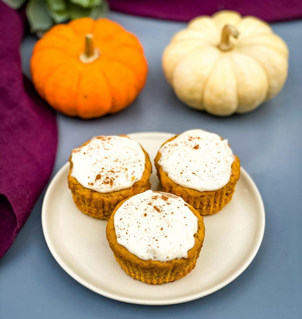 keto low carb pumpkin muffins on a beige plate