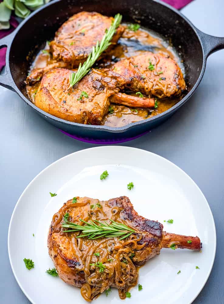 keto low carb smothered pork chops in a cast iron skillet and on a white plate