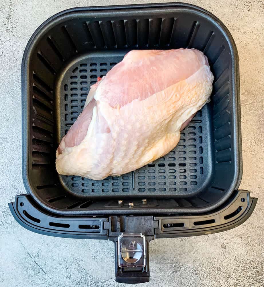 raw turkey breast in an air fryer