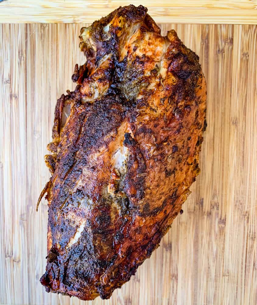 air fryer roasted turkey breast on a cutting board