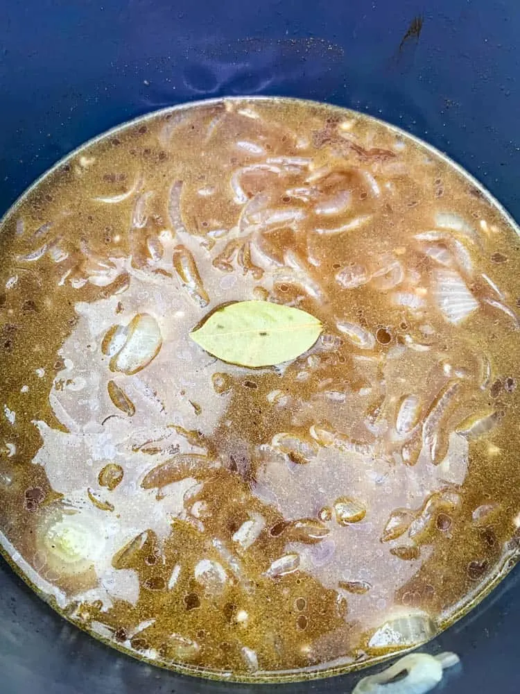 French Onion Soup in an Instant Pot with a bay leaf