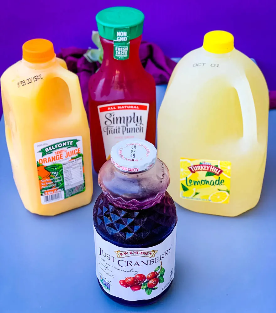 orange juice, lemonade, cranberry juice, and fruit punch in bottles
