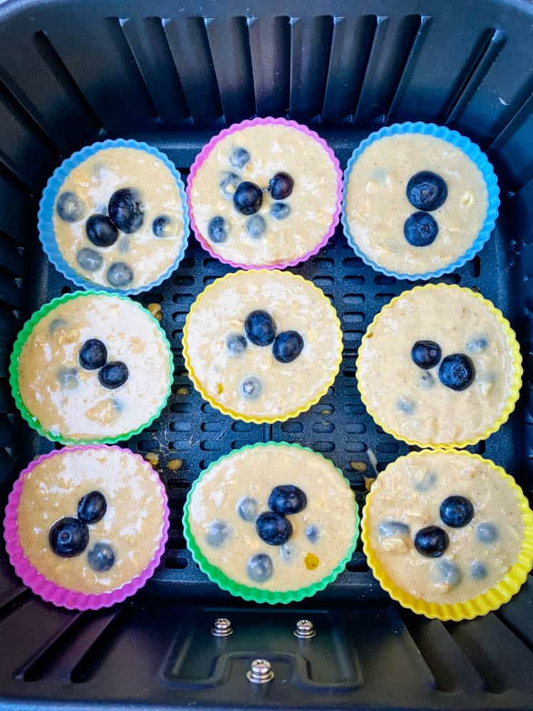 uncooked blueberry muffins in an air fryer