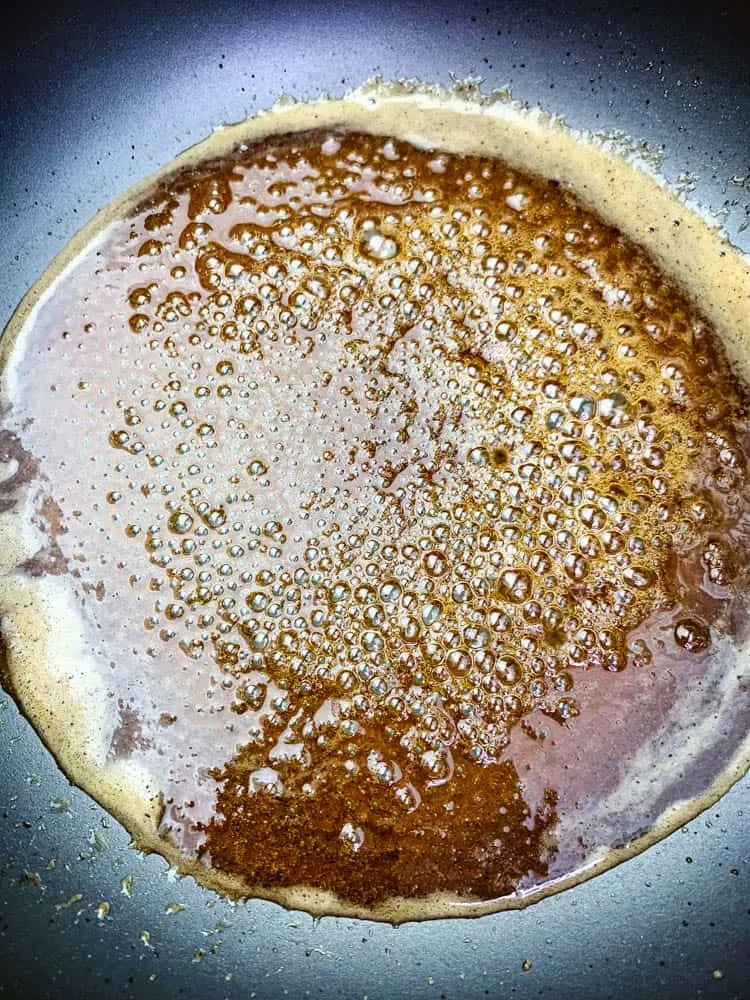 honey, ground cloves, and brown sugar in a pan for air fryer honey glazed ham
