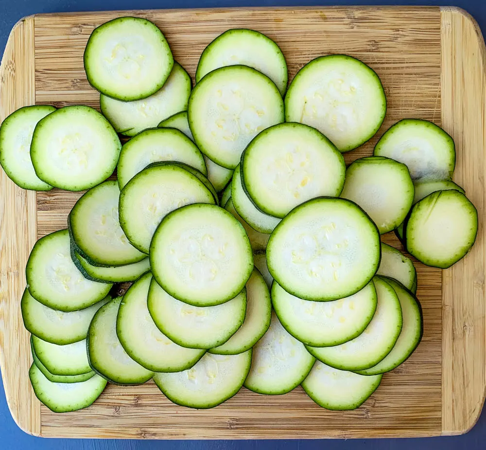 sliced zucchini on a cutting board