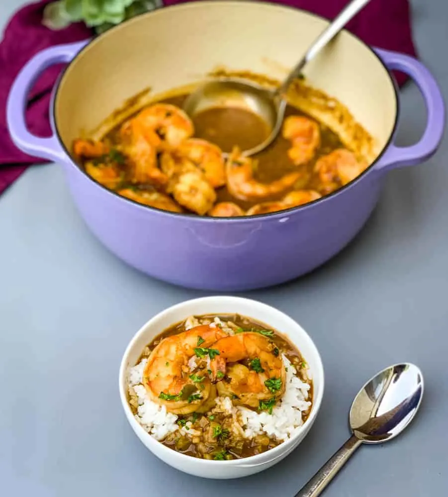 shrimp etouffee in a Dutch oven and in a white bowl