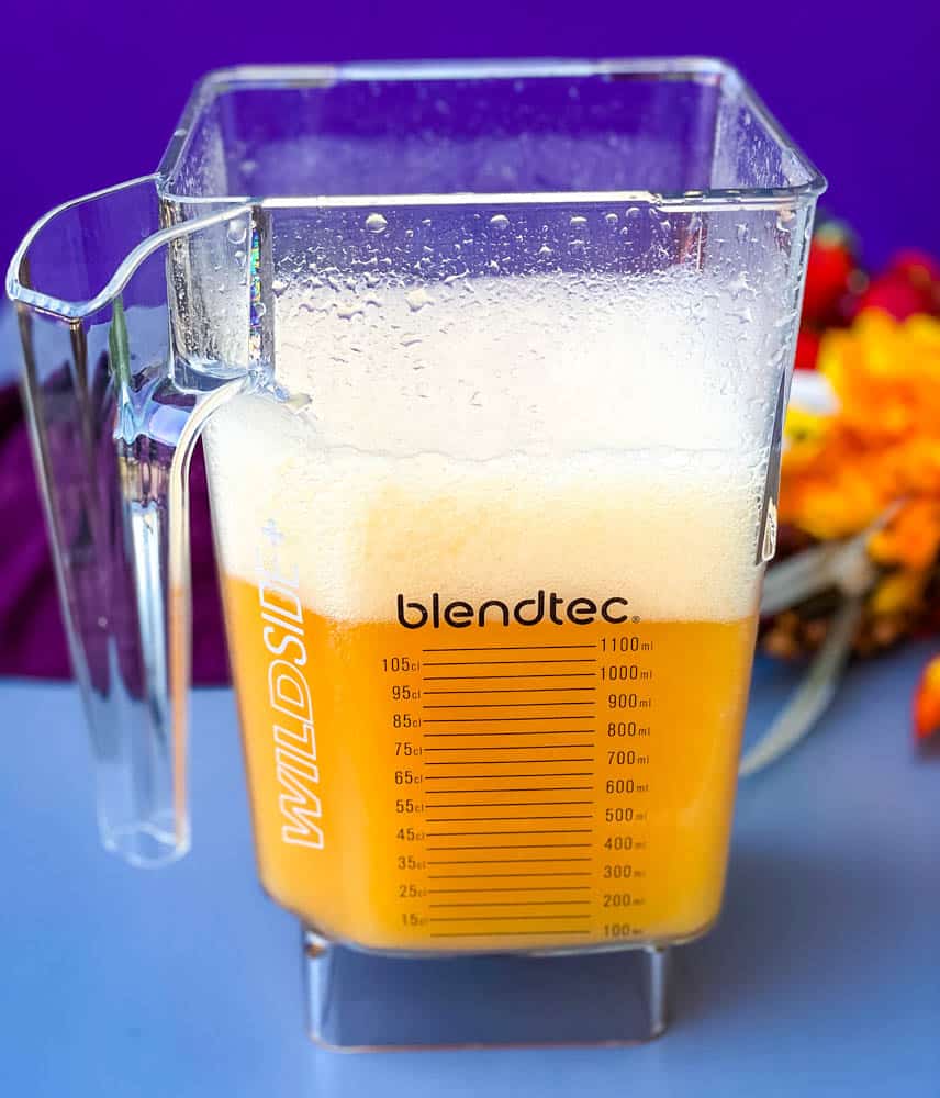 peach bellinis with puree in a blender
