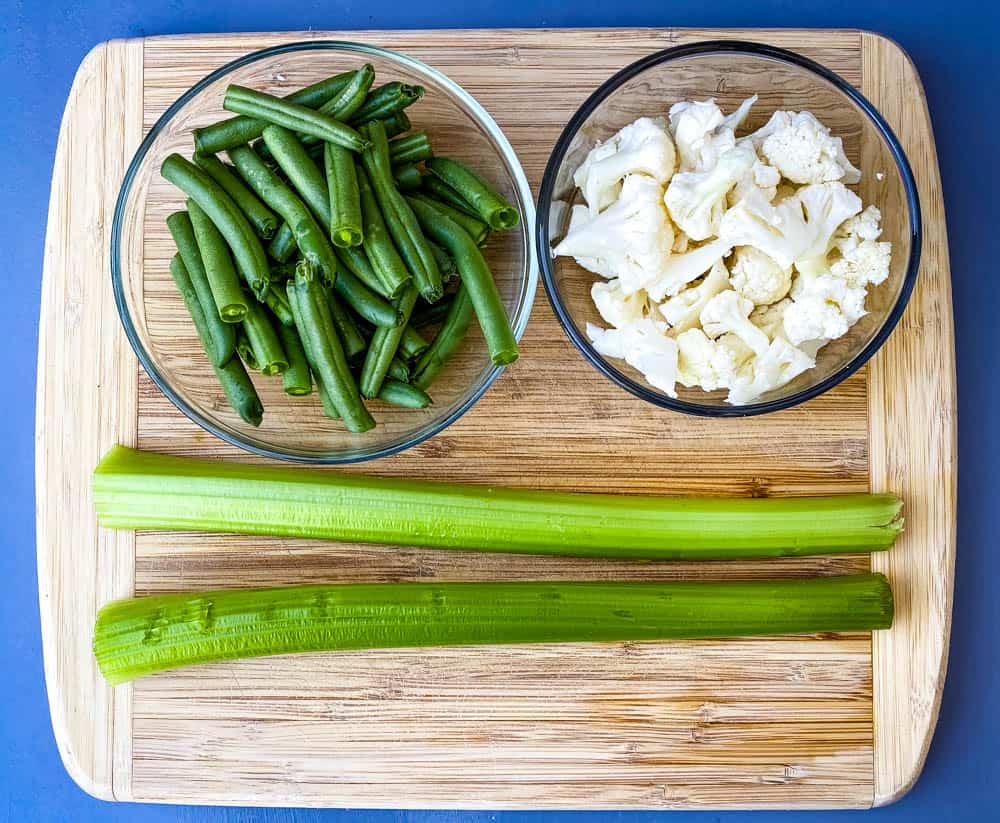 sliced green beans, celery, and cauliflower for keto low carb chicken pot pie recipe