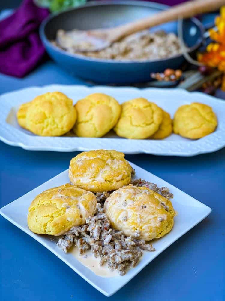 keto low carb biscuits and gravy on a white plate