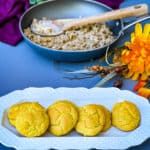 keto low carb biscuits and gravy on a white plate