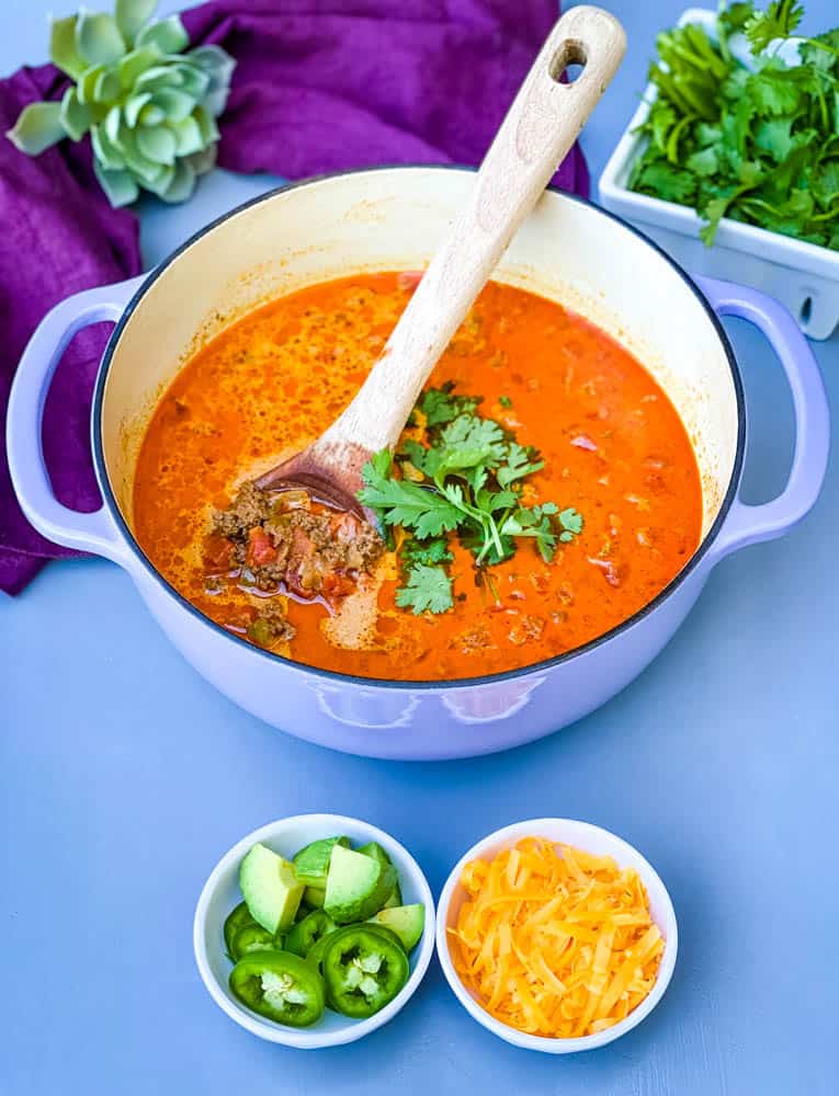 keto low carb taco soup in a purple Dutch oven pot