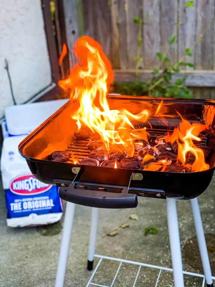 Kingsford charcoal coals burning in a grill