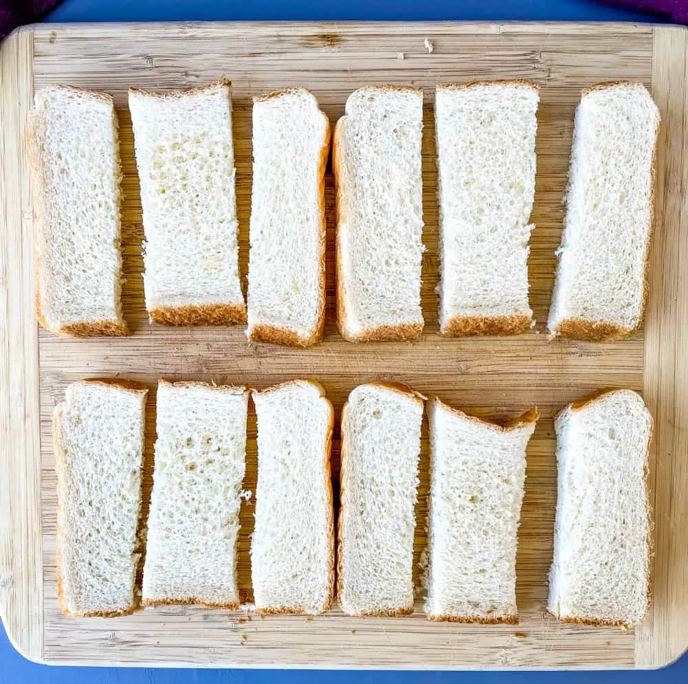 sliced Texas toast bread on a wooden cutting board