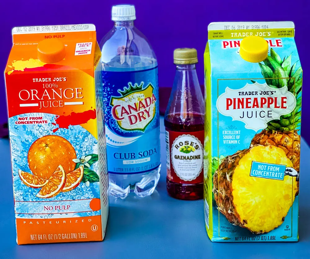 orange juice, pineapple juice, grenadine, and club soda for Bahama Mama recipe