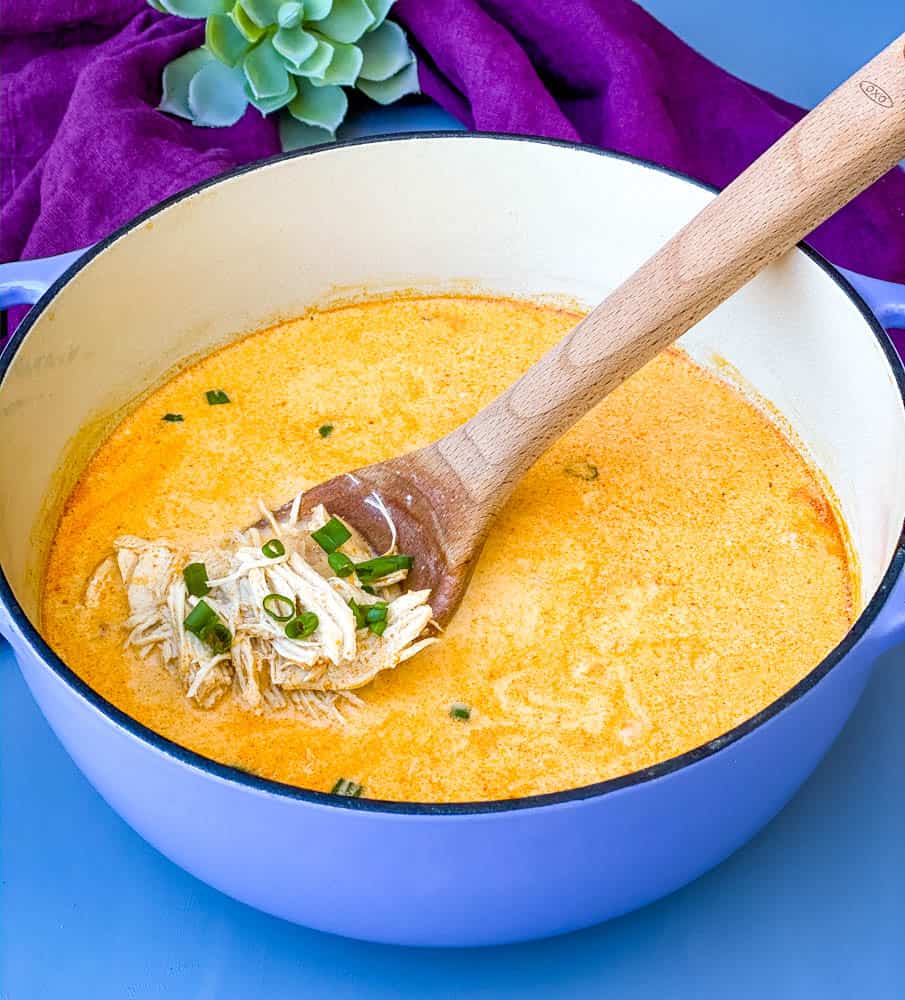 buffalo chicken soup in a purple Dutch oven