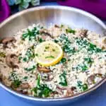 keto low carb cauliflower risotto in a pan with lemon