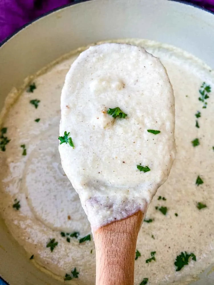 wooden spoon of keto low carb cauliflower soup