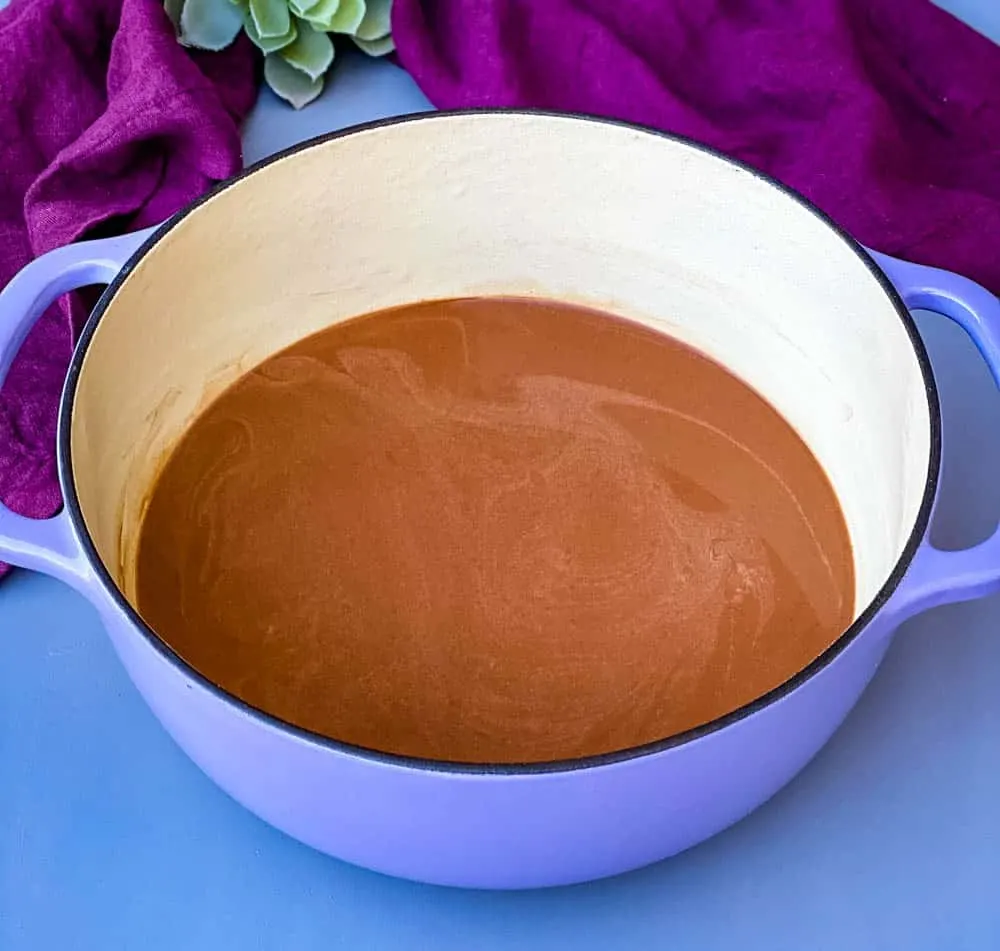 keto low carb hot chocolate in a purple Dutch oven