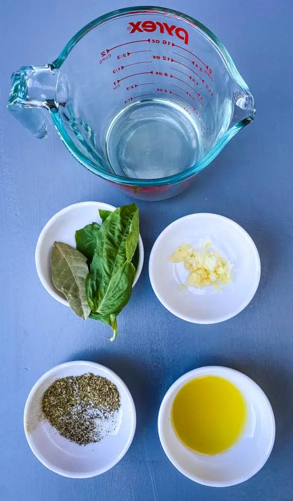 white wine, basil, garlic, olive oil, and spices for keto low carb marinara sauce
