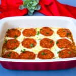keto low carb pizza casserole in a red dish with a red napkin