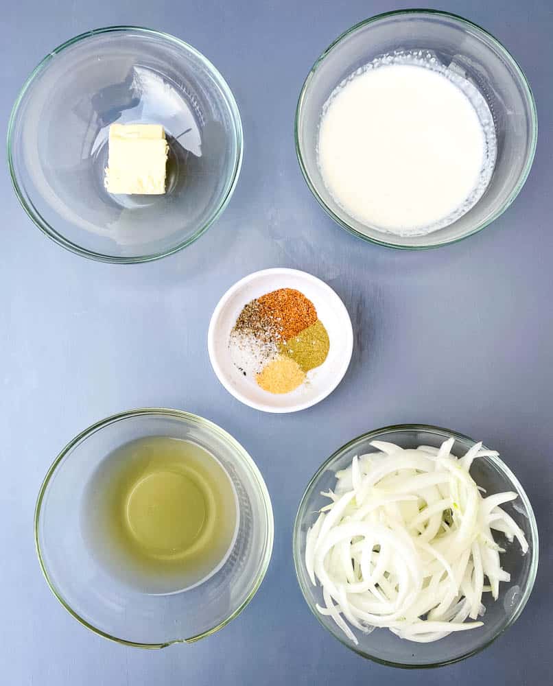 butter, heavy cream, chicken broth, onions, and seasoning for smothered pork chops recipe