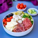 antipasto salad in a white bowl