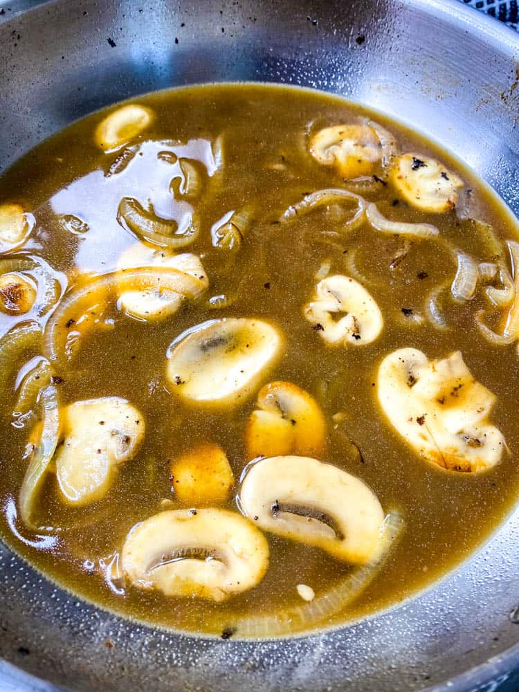 keto mushroom gravy in a stainless steel pan