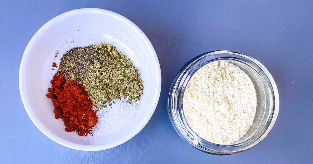 almond flour, smoked paprika, and seafood seasoning in white bowls for salmon patties