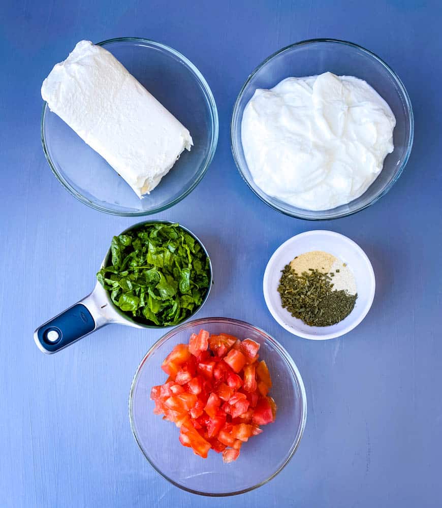 cream cheese, Greek yogurt, shredded lettuce, tomatoes, and ranch seasoning in separate bowls
