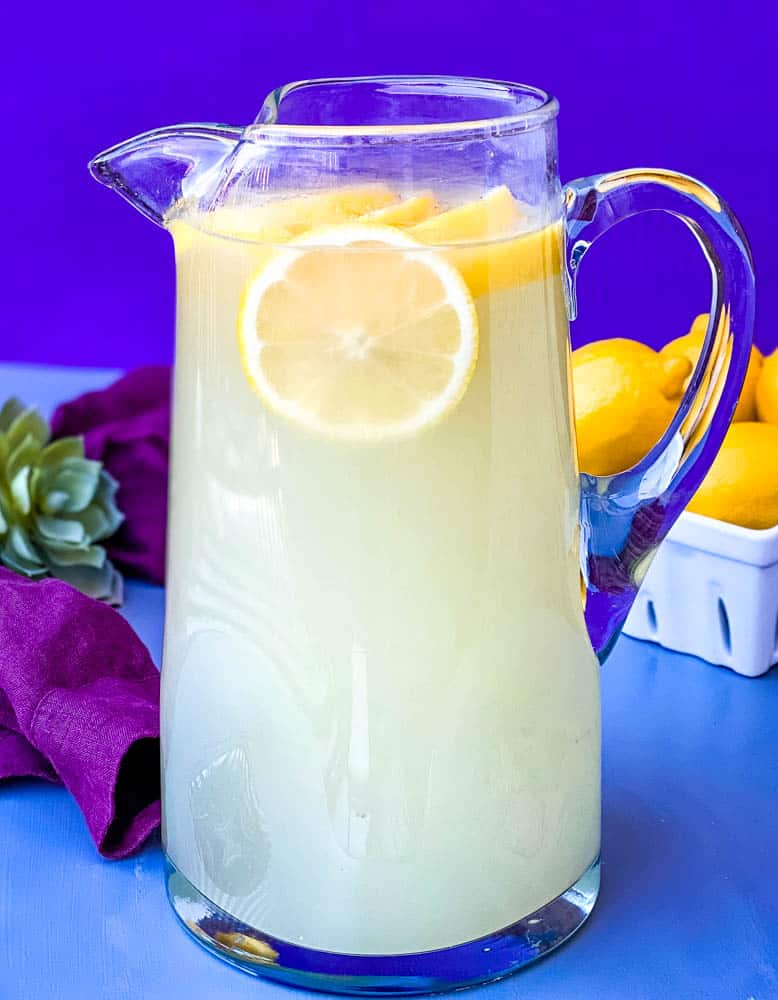 keto low carb lemonade in a pitcher with fresh lemons