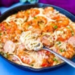 cajun shrimp pasta in a cast iron skillet