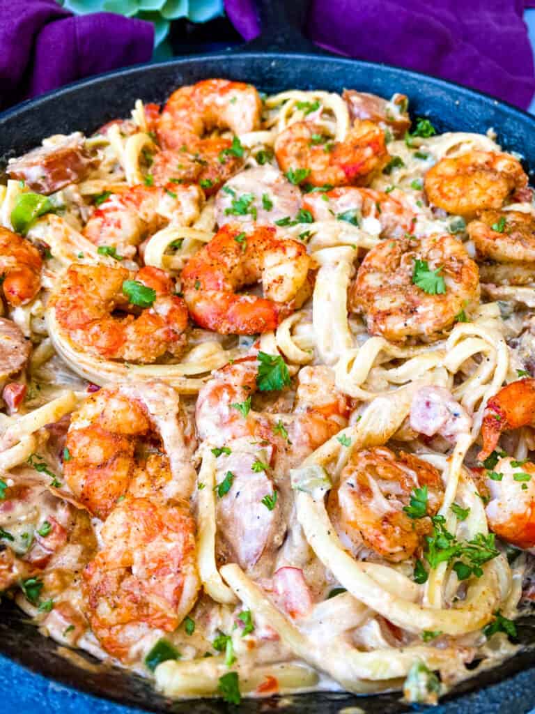 Cajun shrimp pasta in a cast iron skillet