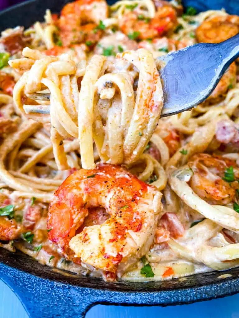 a forkful of Cajun linguine pasta with shrimp