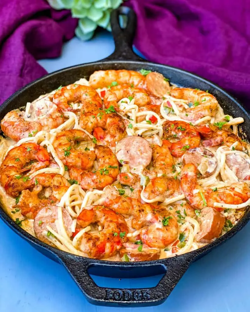 cajun shrimp pasta with low carb pasta in a cast iron skillet