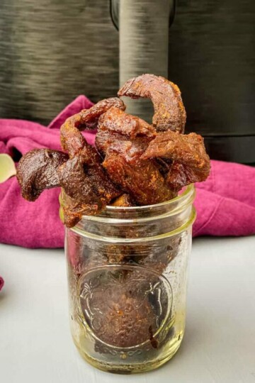 air fryer beef jerky in a glass cup