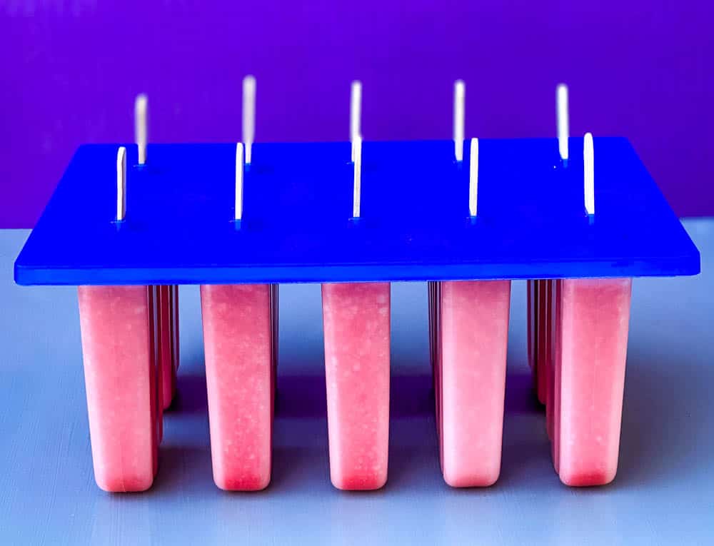 sugar free lemon strawberry mix in a popsicle mold