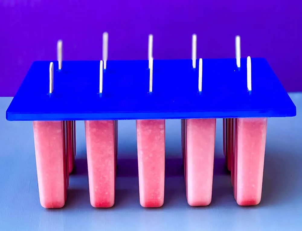 sugar free lemon strawberry mix in a popsicle mold