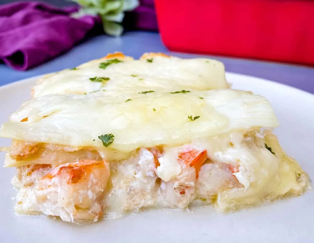 seafood lasagna on a white plate