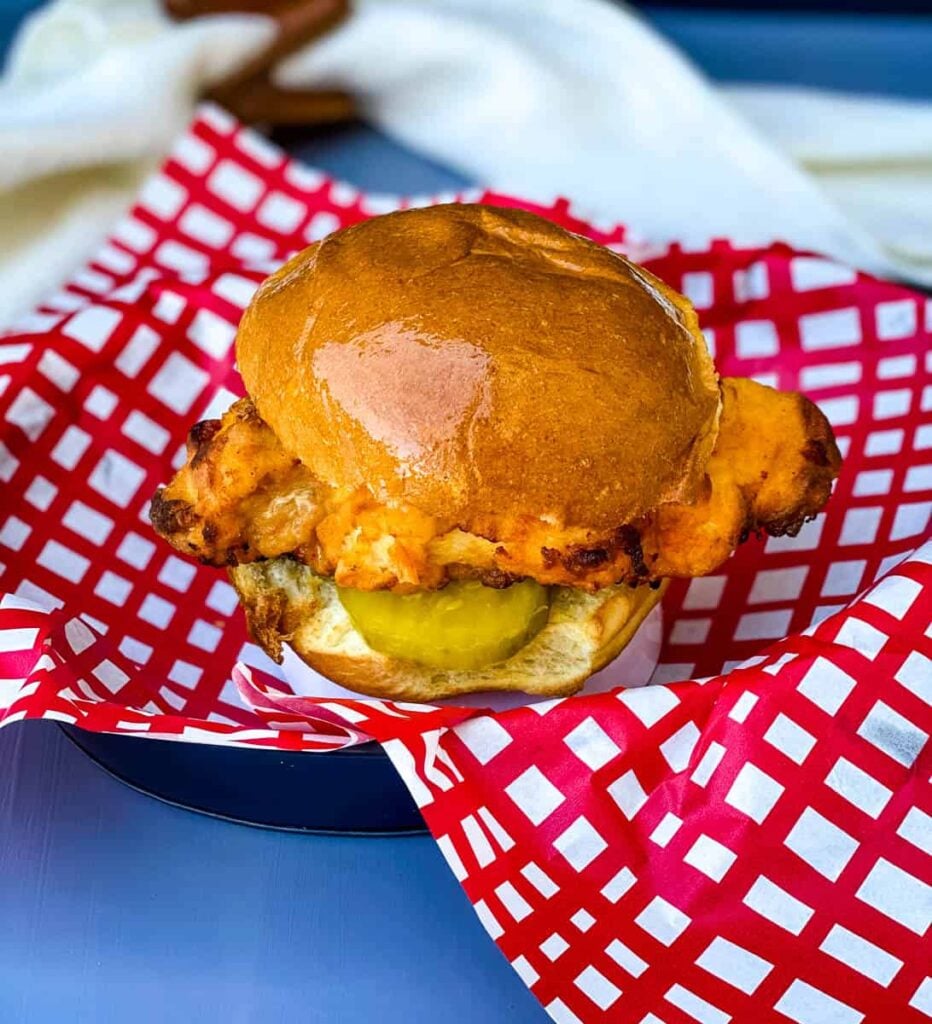 air fryer chick-fil-a chicken sandwich in a bowl with pickles