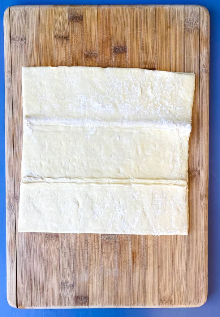 puff pastry on a bamboo cutting board