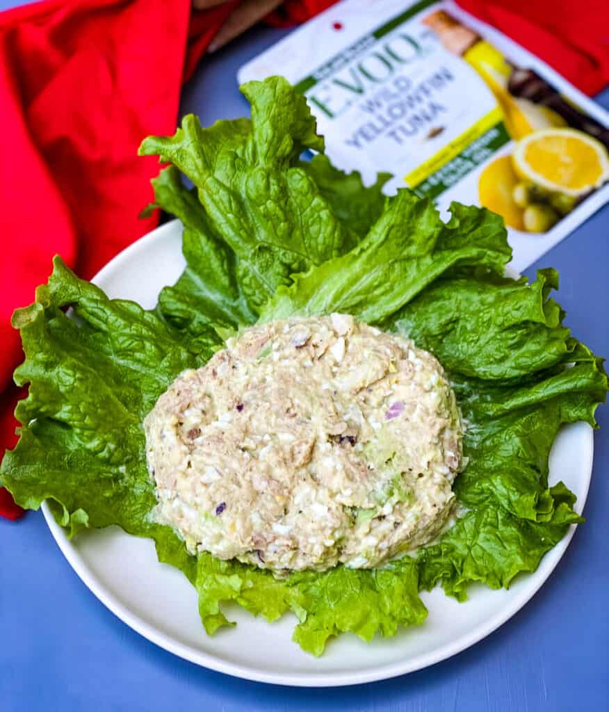 avocado tuna on a white plate with romaine lettuce