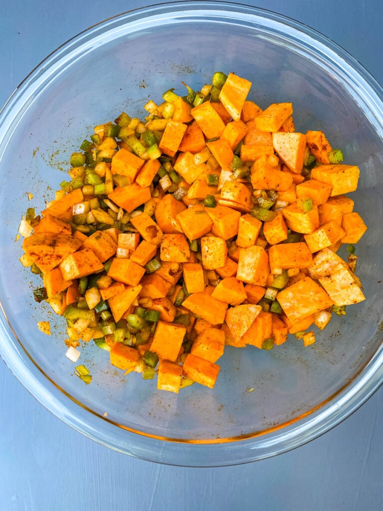 raw sweet potato hash in a glass bowl