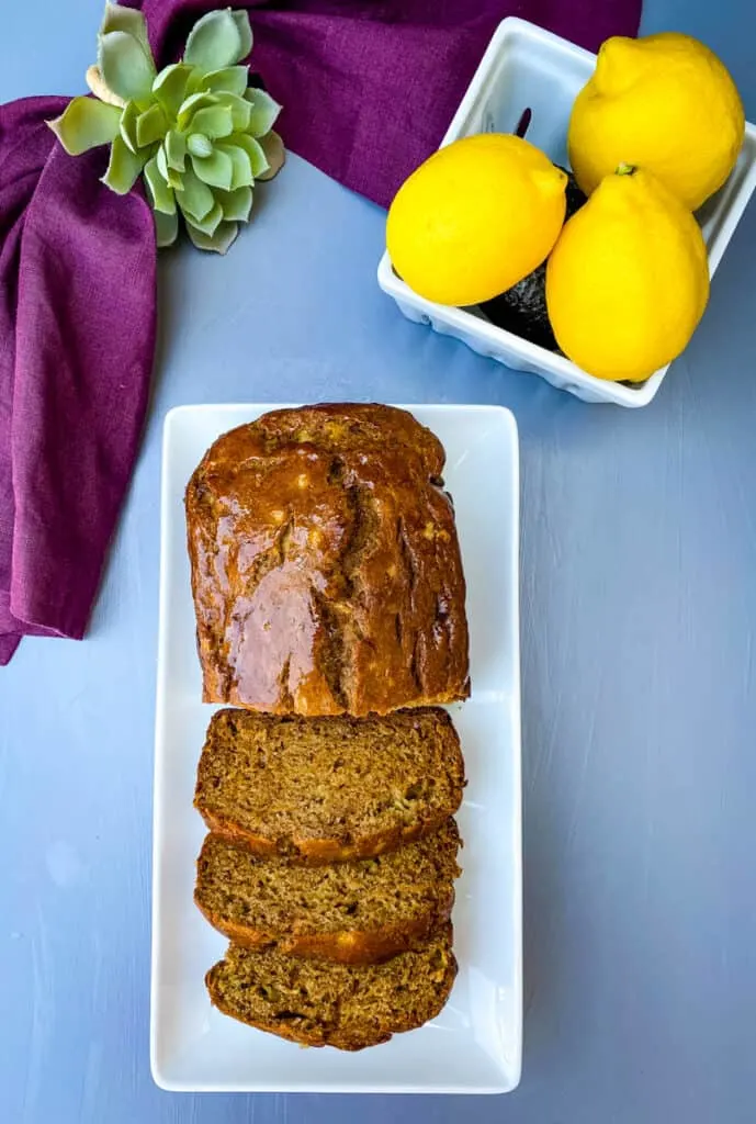 healthy banana bread sliced on a white plate