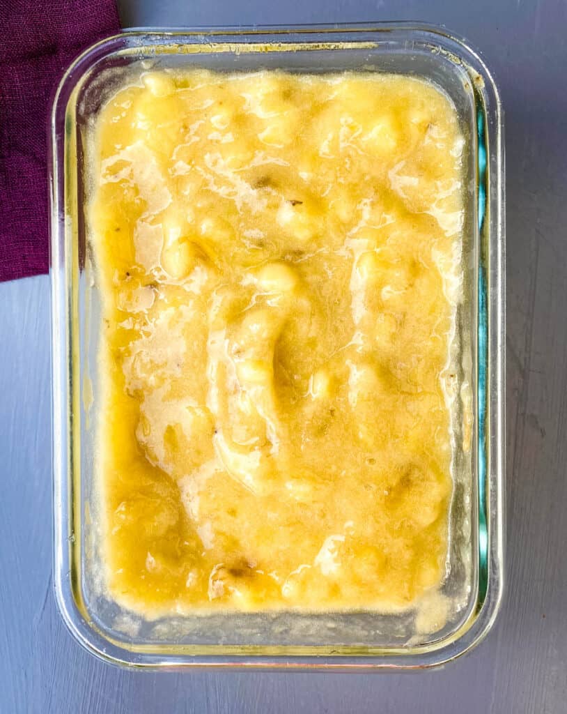 mashed bananas in a glass bowl