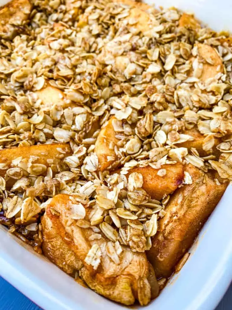 healthy apple crisp in a red baking dish