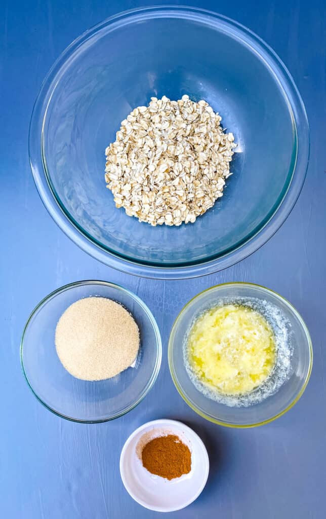 rolled oats, melted butter, brown sweetener, and cinnamon in separate bowls