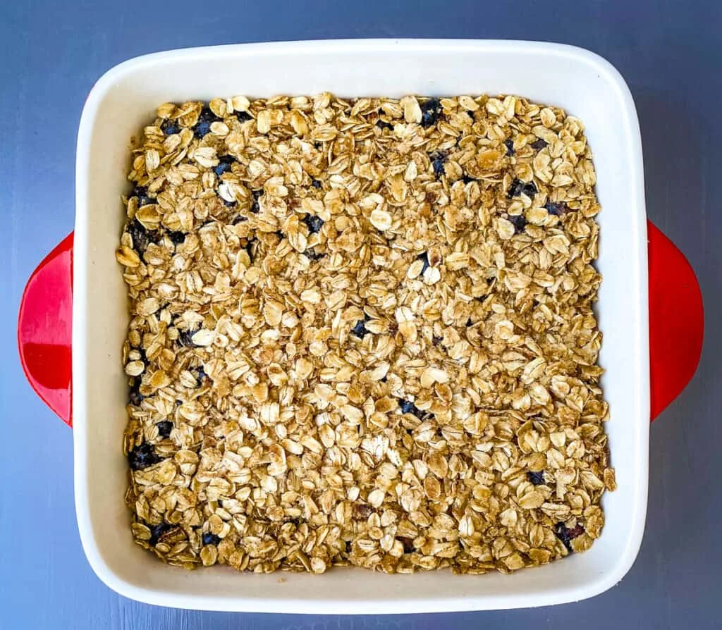 unbaked healthy blueberry crisp in a baking dish